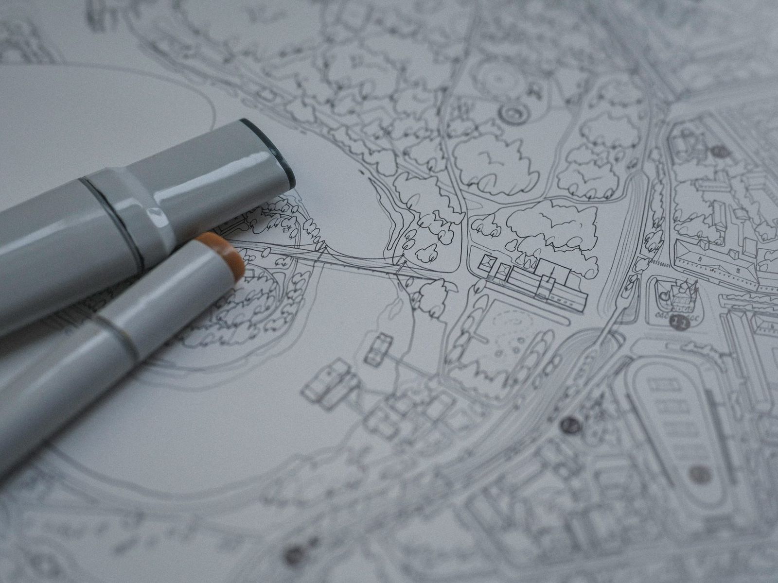Annotated site plan or constraints map laid out on a table